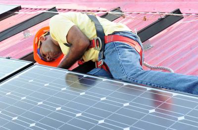 Black-man-installs-solar-panels-on-own-home